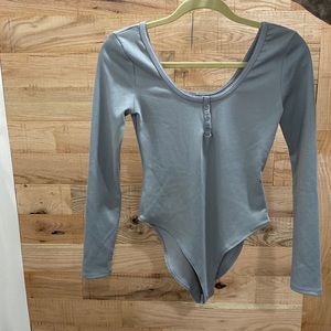 Grey long sleeve body suit